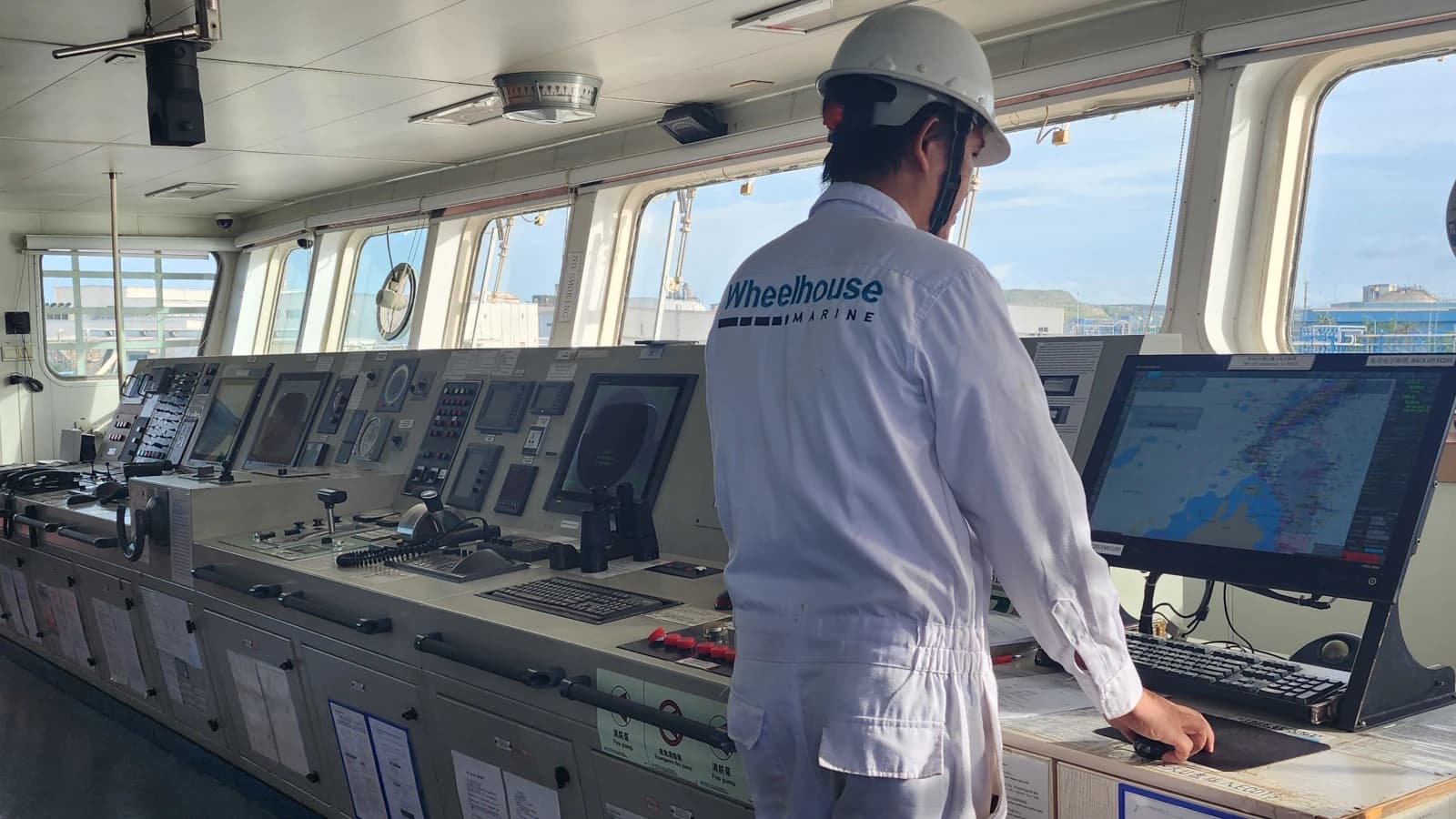 wheelhouse service engineer repairing navigation antenna on board